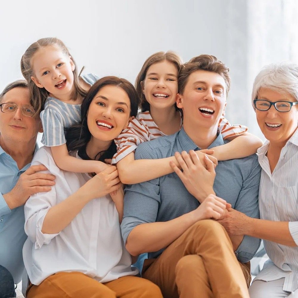 gruppfoto familj i 3 generationer med ITeraCare